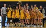 11 basketball players & 3 coaches with trophy